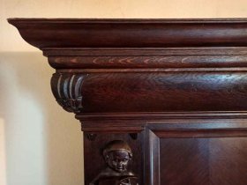repraesentativer-buecherschrank-mit-figuren-um-1910-eiche.8